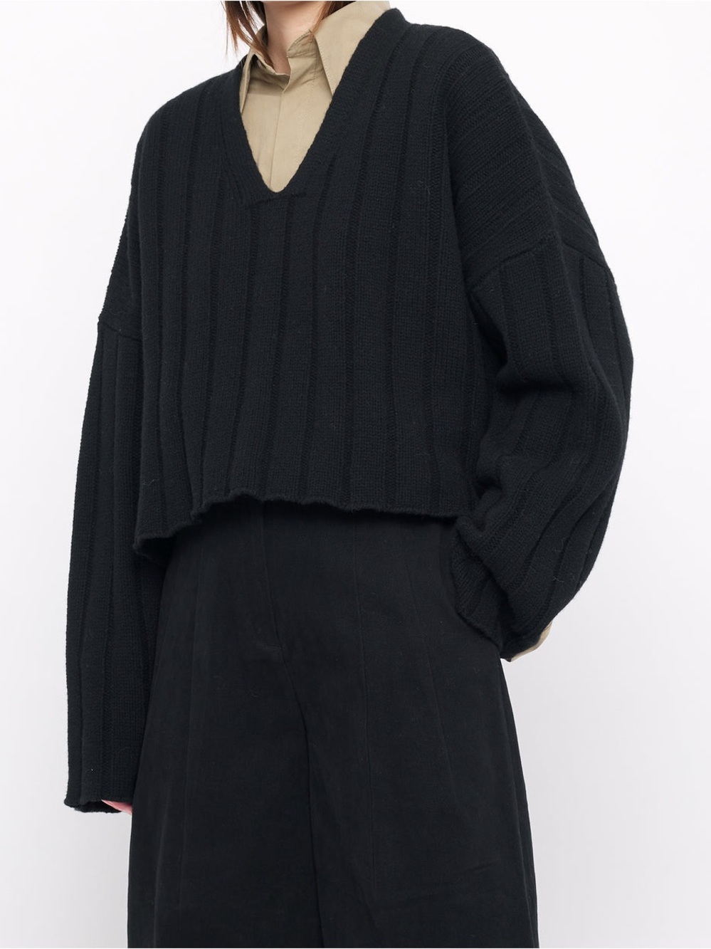 7115 by Szeki Oversized Ribbed V Neck Wool Sweater in Black